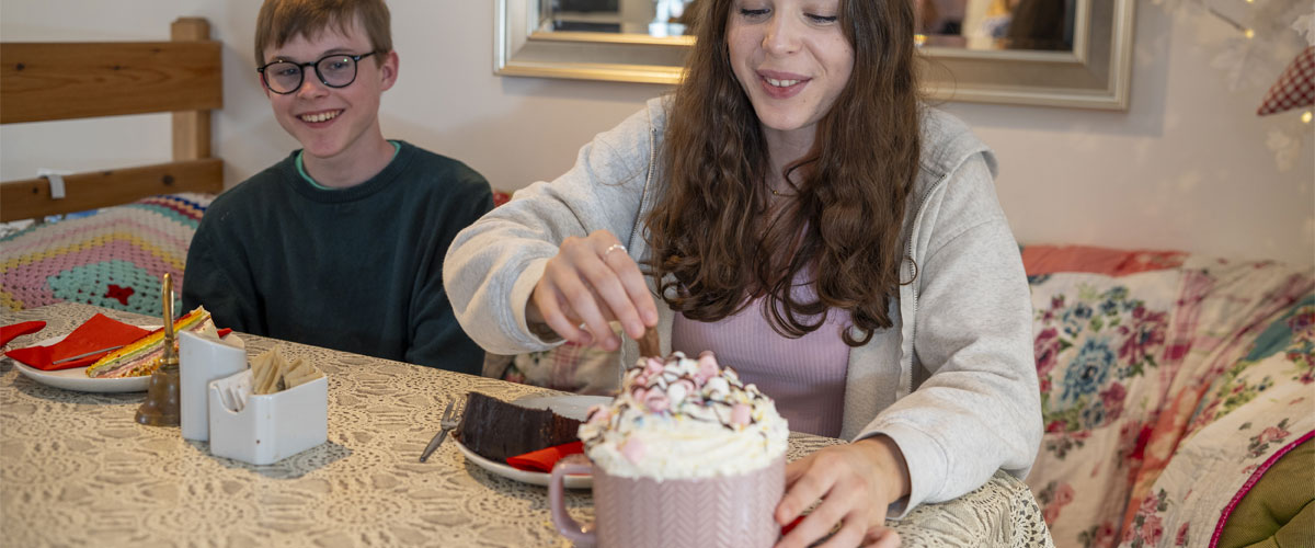 Kids enjoy a hot chocolate with marshmallows at The Fairydust Emporium