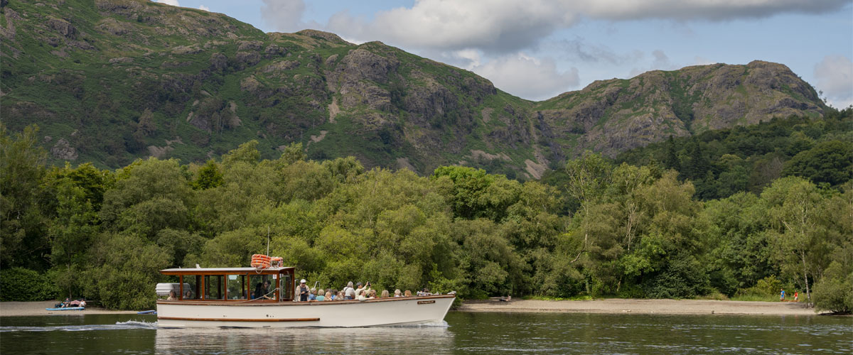 A passenger boat on Coniston Water in the Lake District, Cumbria