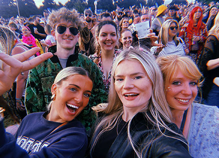 Cumbria Tourism staff pose for a selfie at Kendal Calling